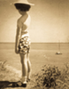 Sepia photo of Julie aged 8, overlooking the English Channel.